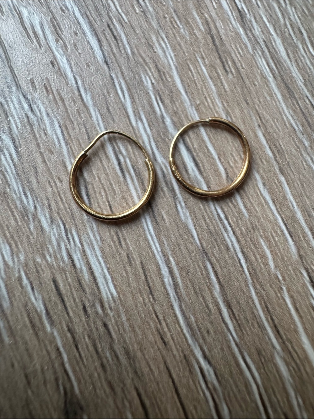 not available —- 14k Mini gold hoop earrings